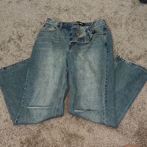 Fashion Nova Asymmetric Button-Fly Jeans